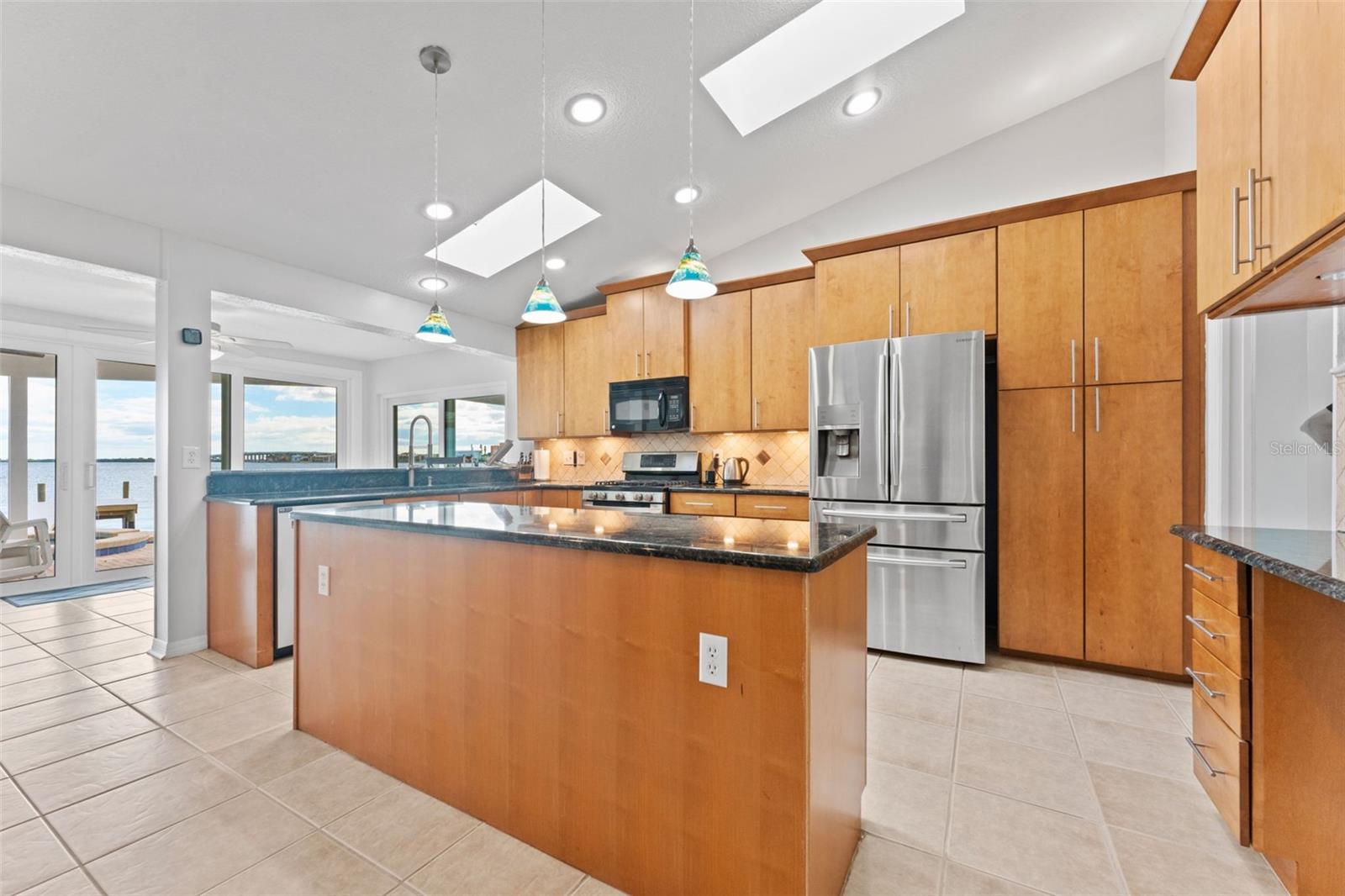 Spacious and stylish, the kitchen features a large island and an open-concept design that’s perfect for cooking, dining, and entertaining.