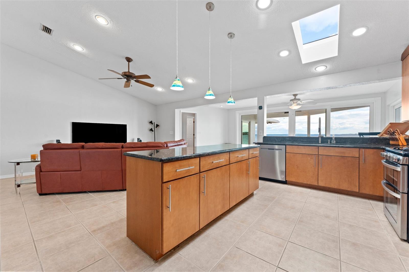Seamless open-concept design connects the kitchen and family room, creating the perfect space for gatherings and everyday living.