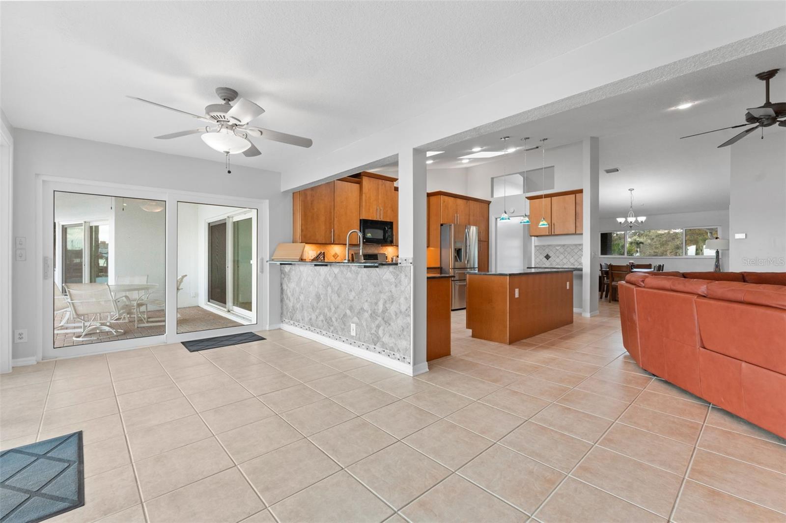 Cozy breakfast nook/bonus room with bar seating, perfect for casual meals or morning coffee just steps from the kitchen.