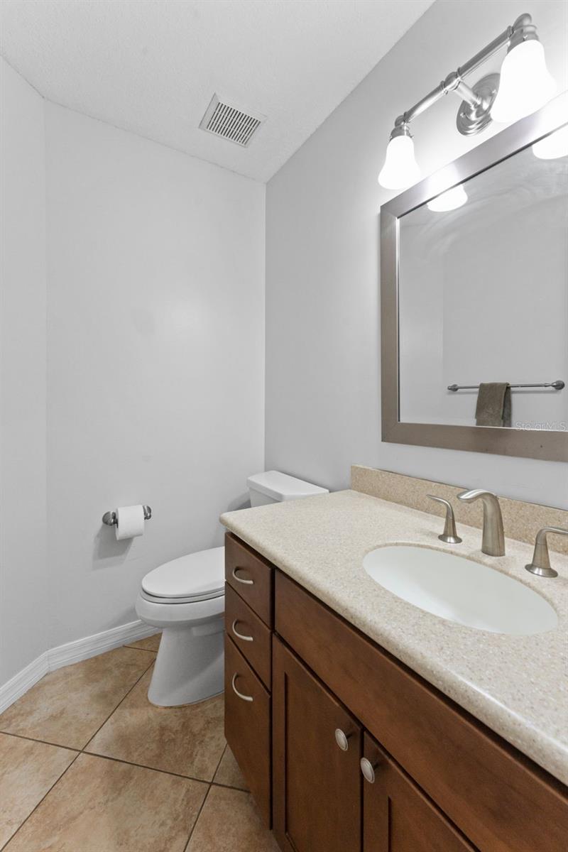 Convenient half bath attached to Bedroom 2, perfect for guests or everyday use.