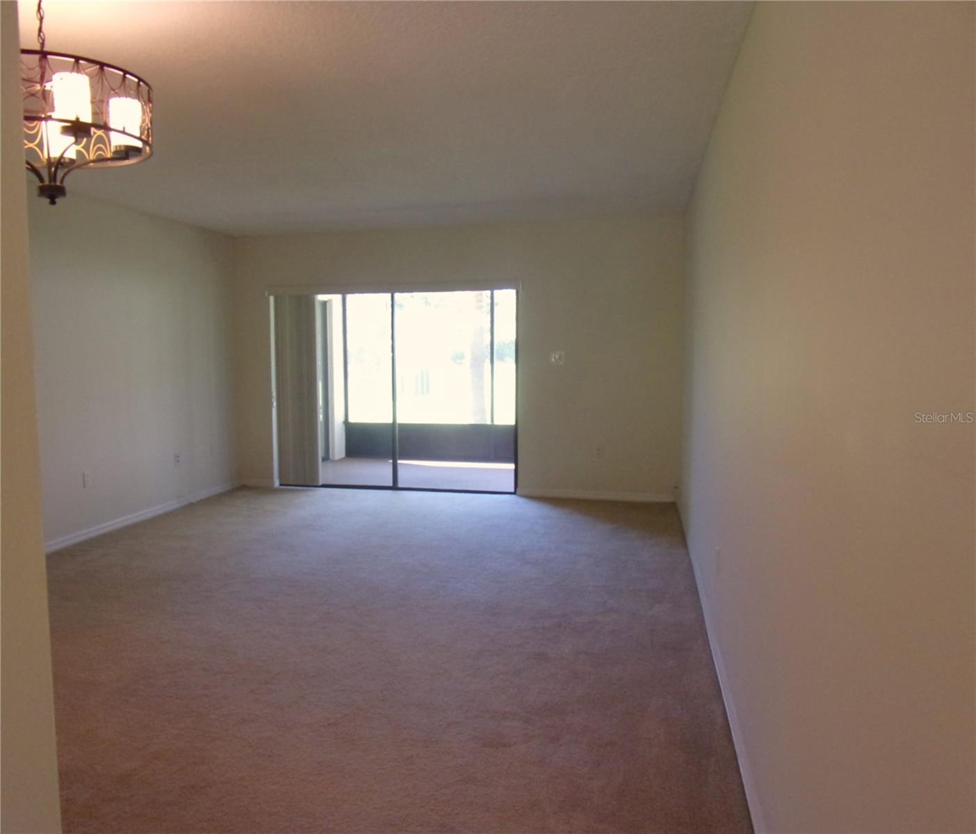 Front door, dining, living room to patio