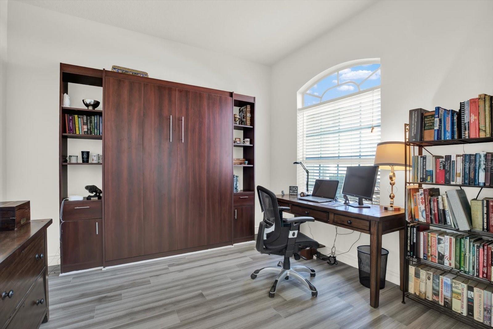 office/den with custom murphy bed