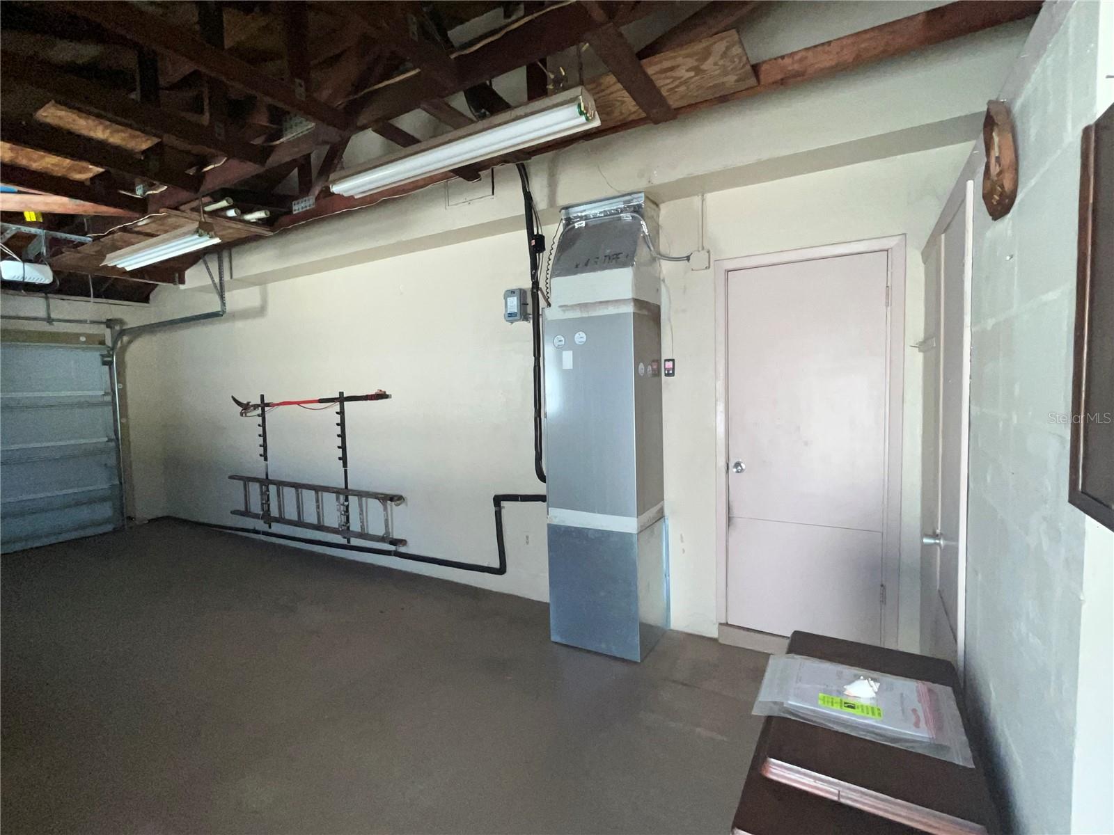 Garage Entry Door to Dining Area