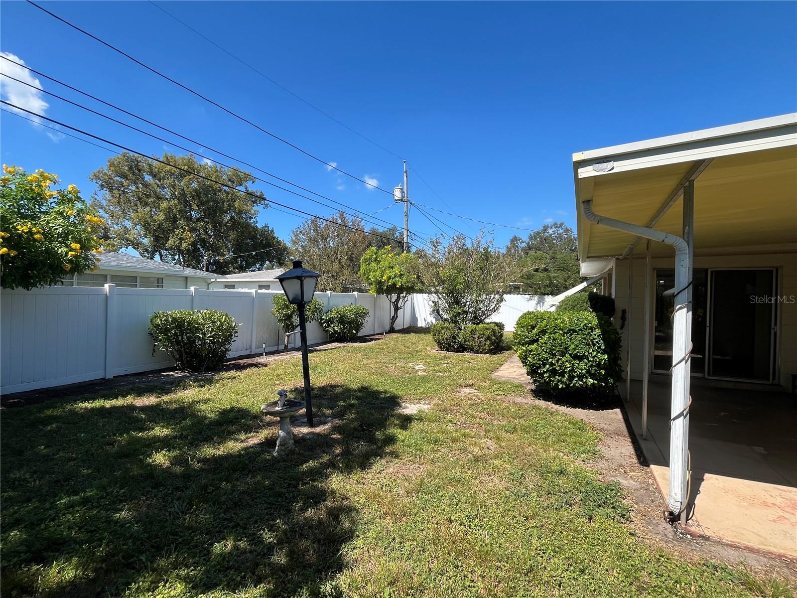 Back Yard to Porch and Sliding Glass Door