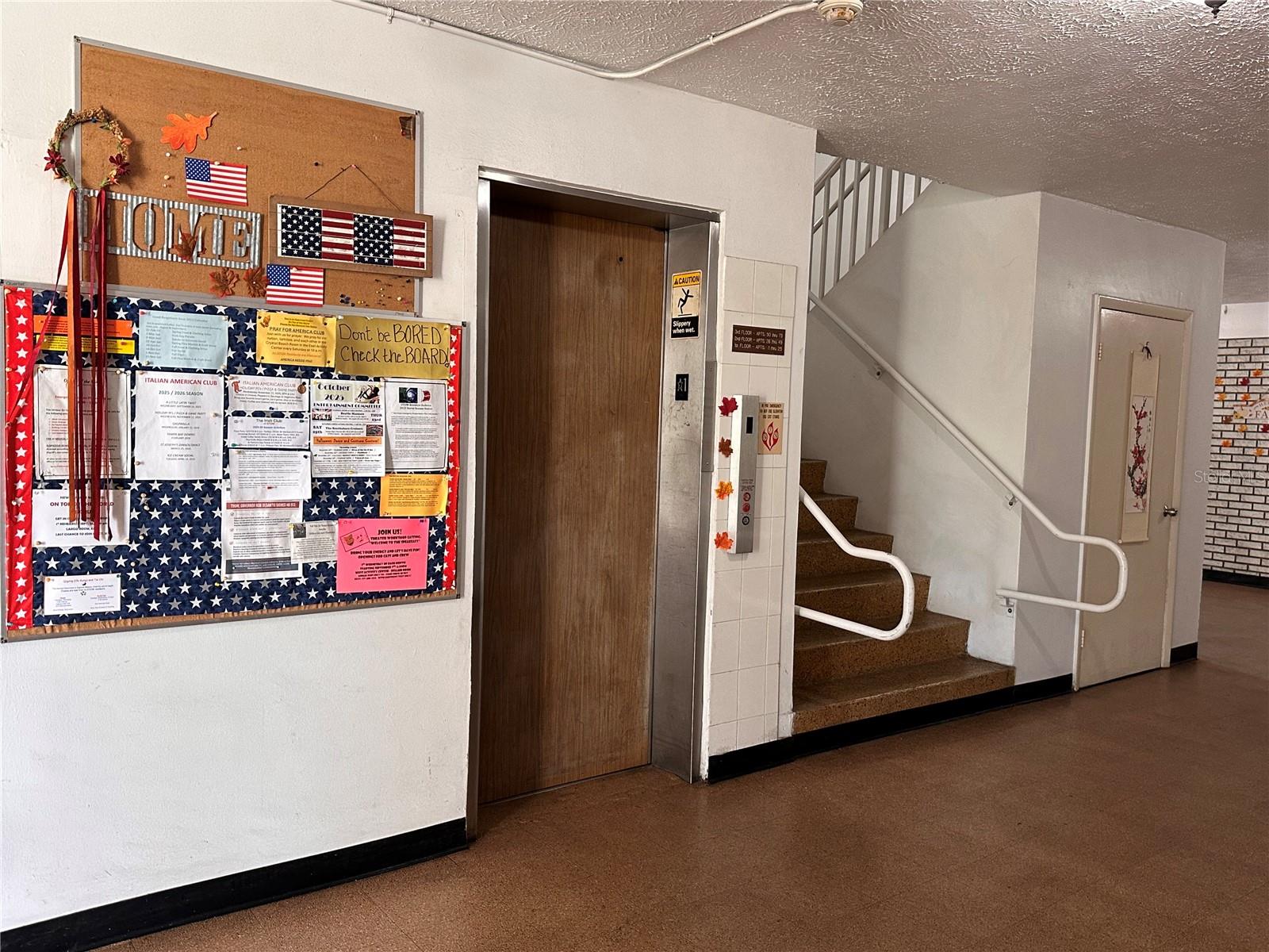 Elevator and stairs, activities board