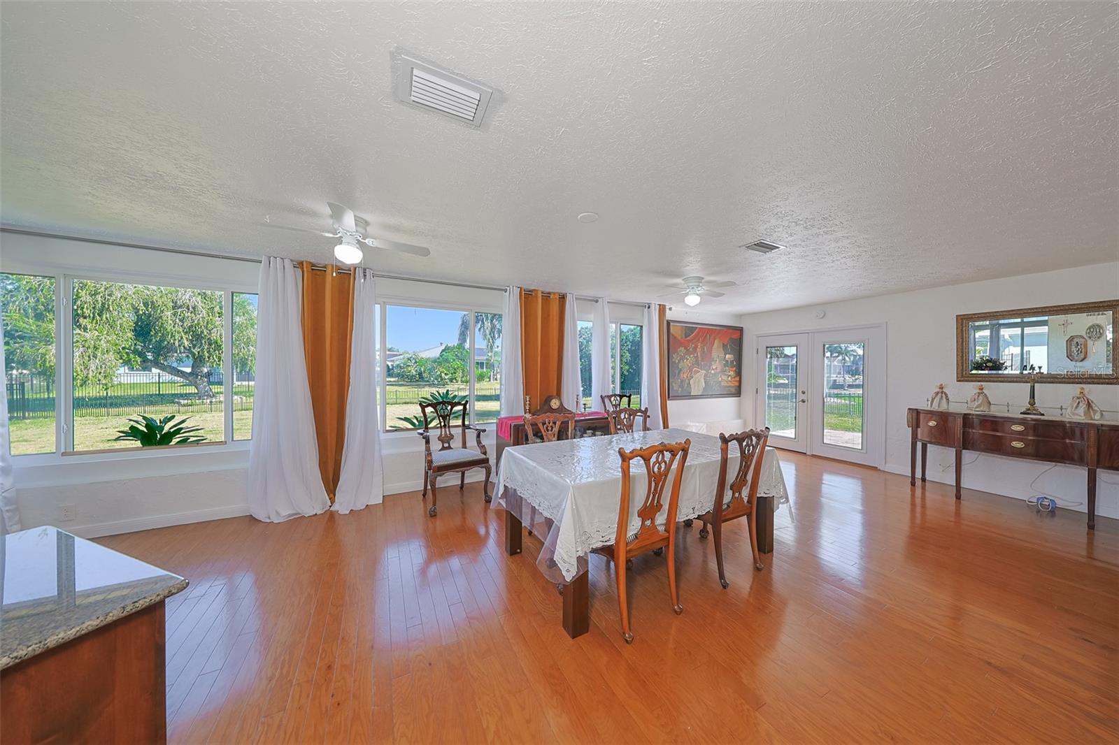 Family Room/Dining Room with double doors to outside patio
