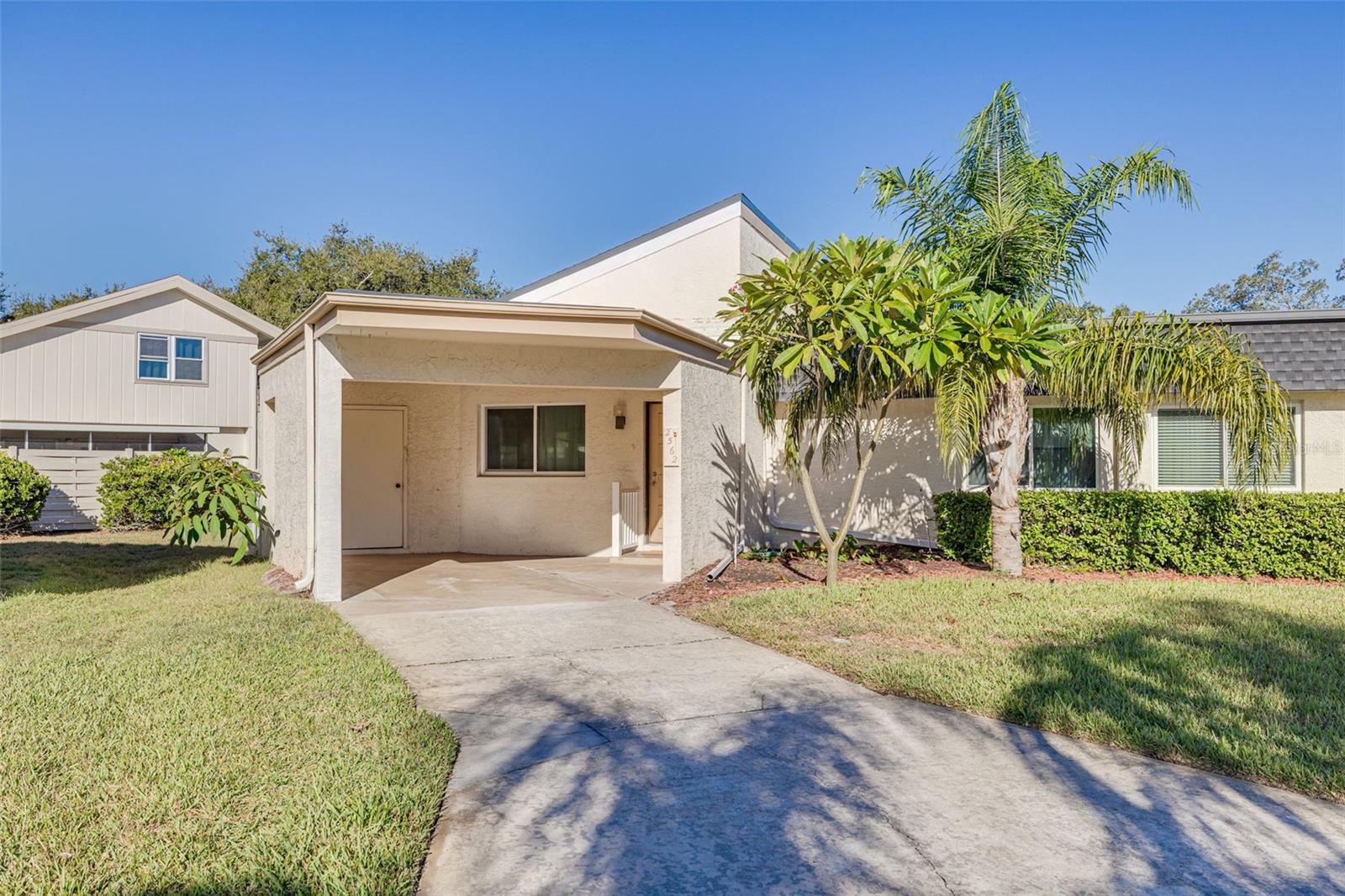 Private carport with outdoor storage closet!