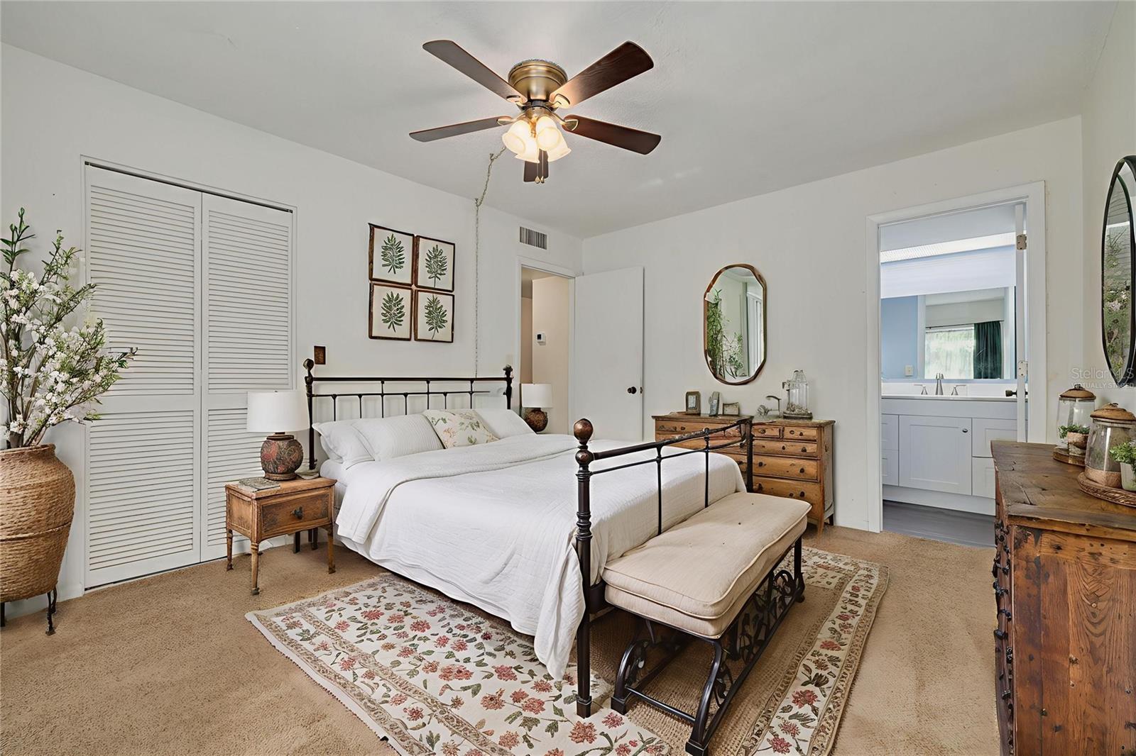 Virtually Staged Primary Bedroom with private bathroom