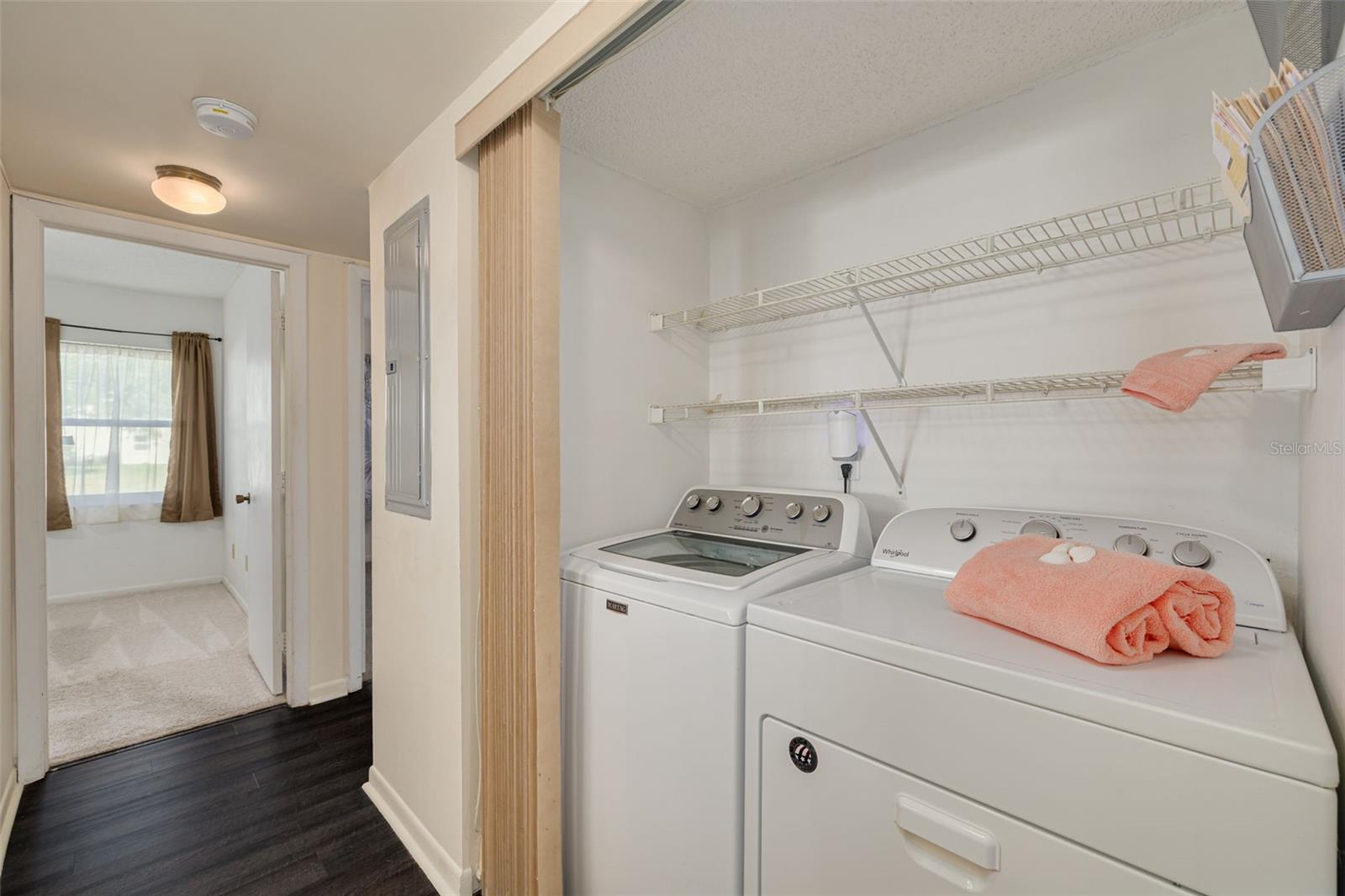 Inside laundry, washer and dryer convey!