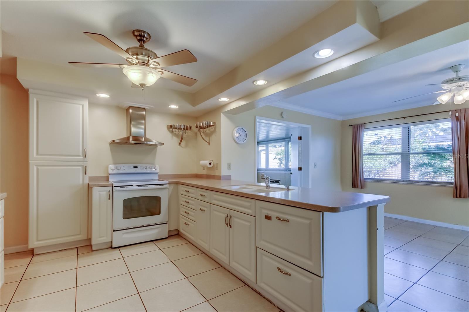 Kitchen opens to Family Room & Dining Area