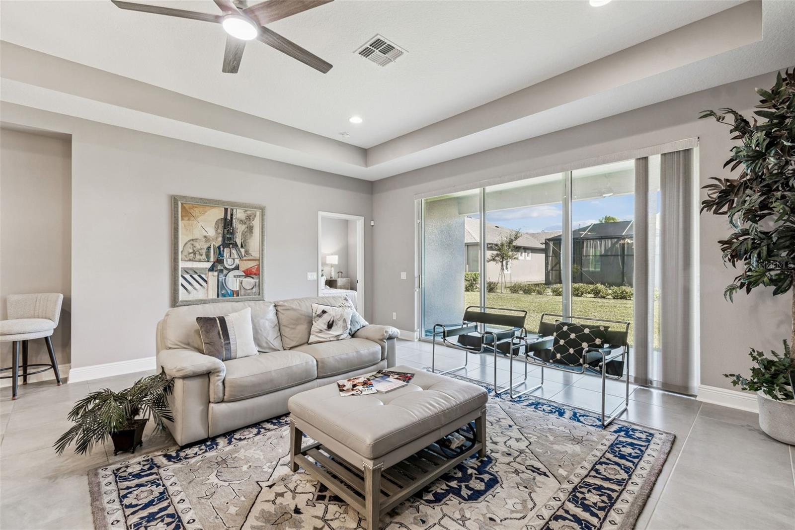Living Room | with lanai backyard view