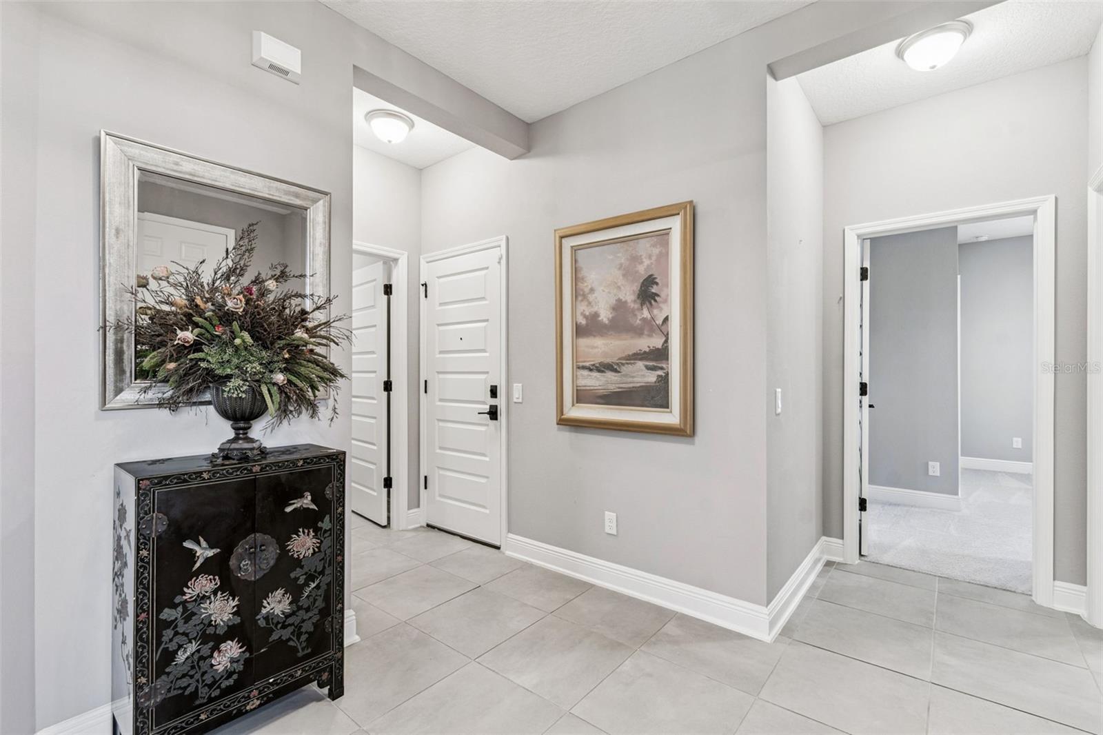 Hallway leading to garage and laundry room
