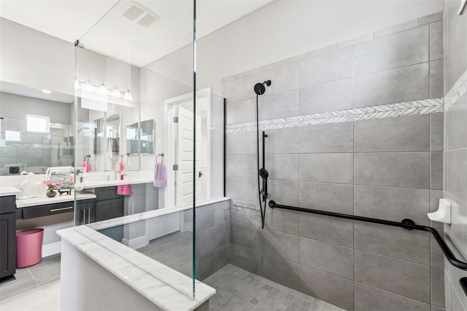 Huge walk in shower| glass doors