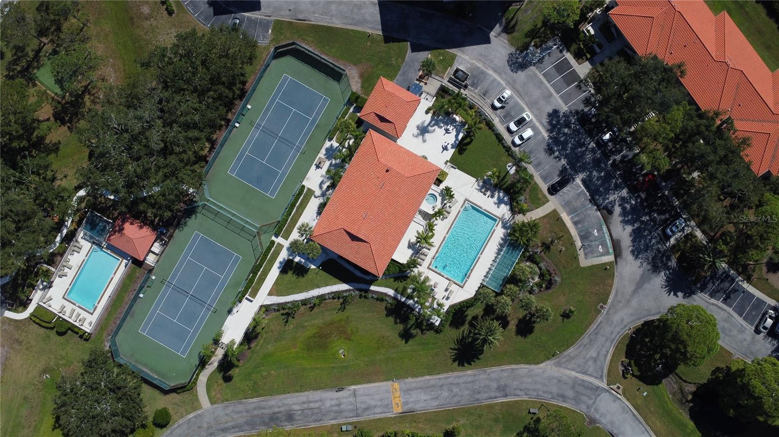 Clubhouse, pools, tennis court and fitness center