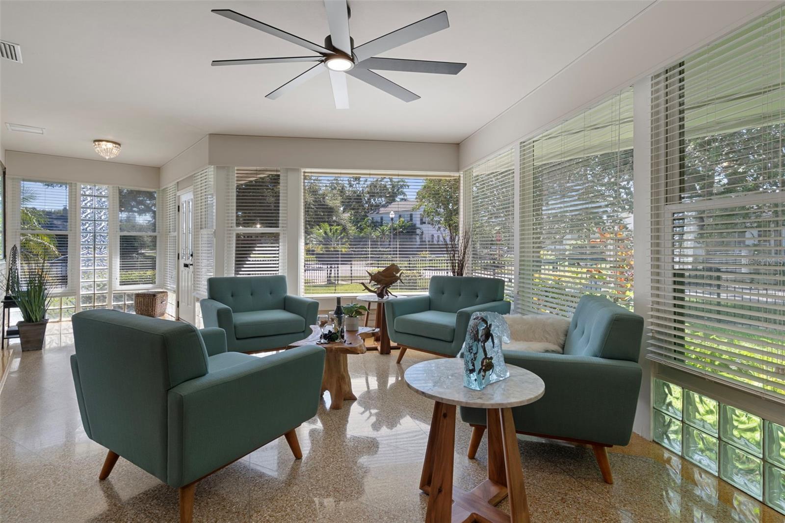 Glass blocks cast a beautiful glow across the terrazzo flooring.