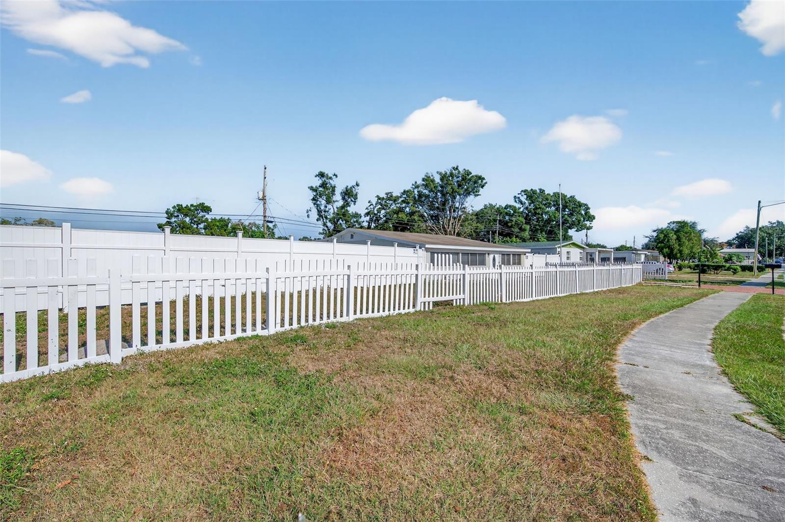 Picket fencing along the front of the home