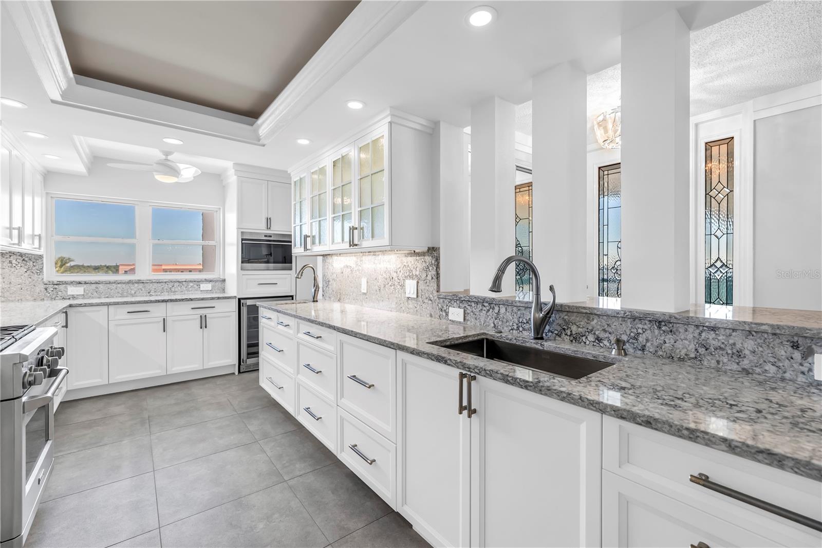 Ample countertops and custom cabinets in kitchen