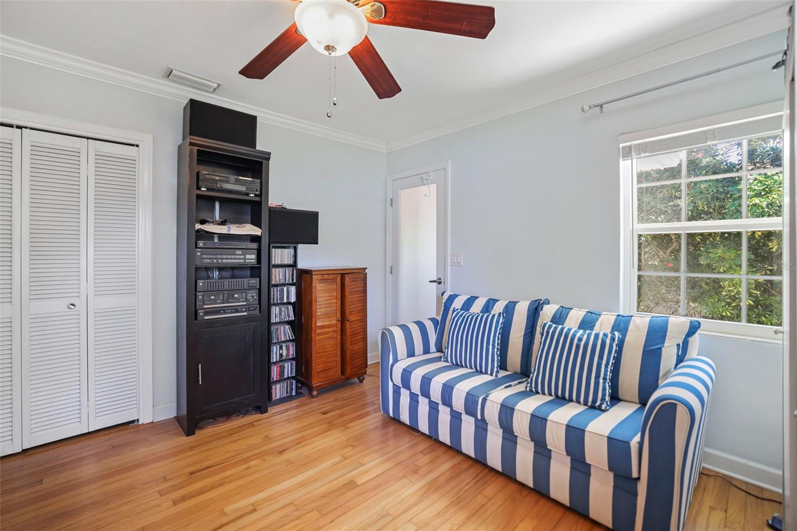 Bedroom 2 with original hardwood floors