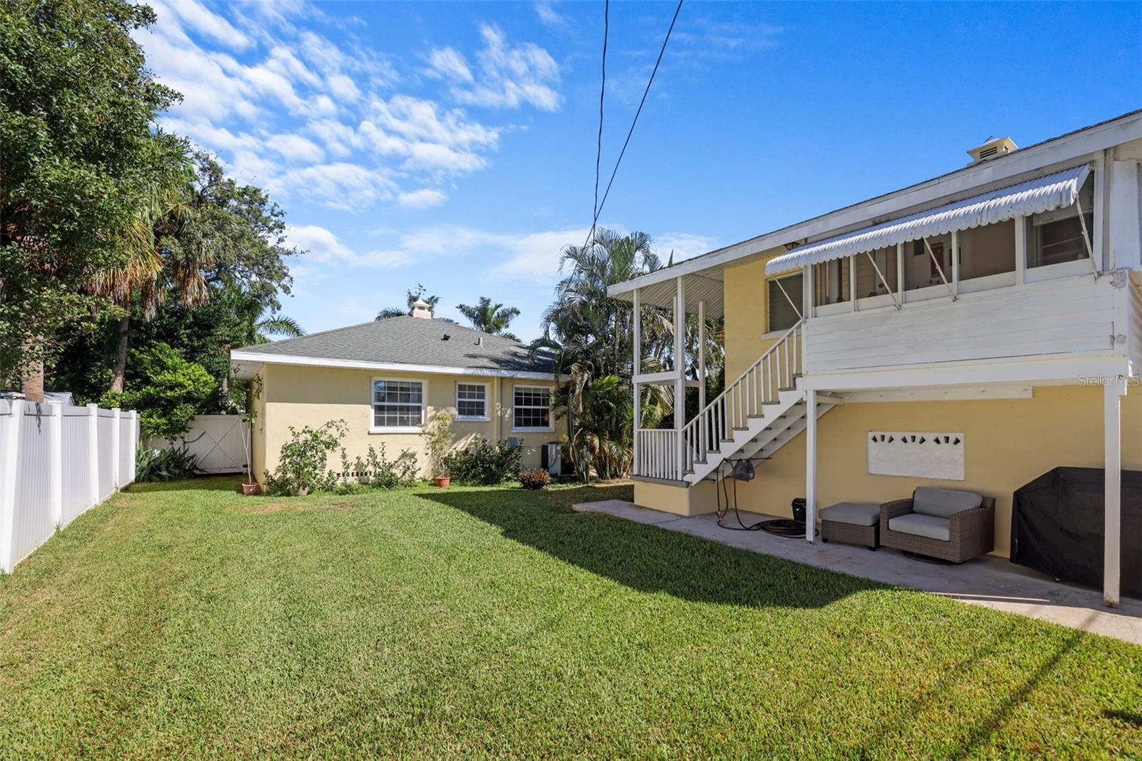 Completely fenced with white vinyl fence