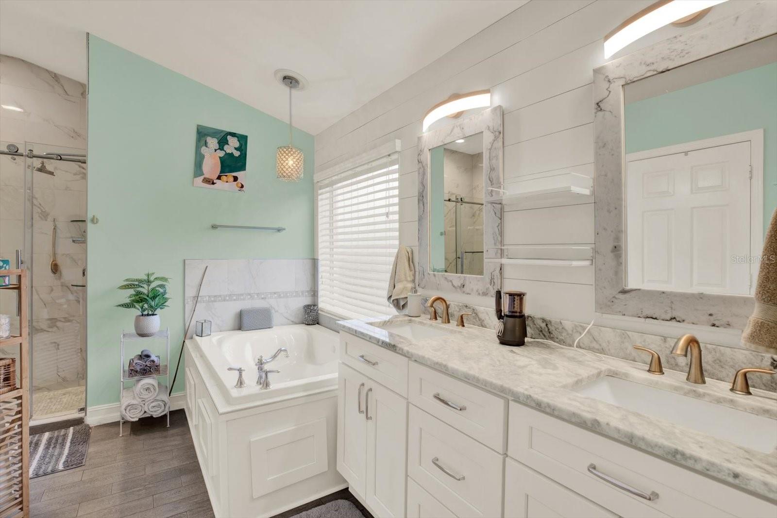 Ensuite with Burlap Walls, Stoner Counters, Tub and Glass Shower Stall