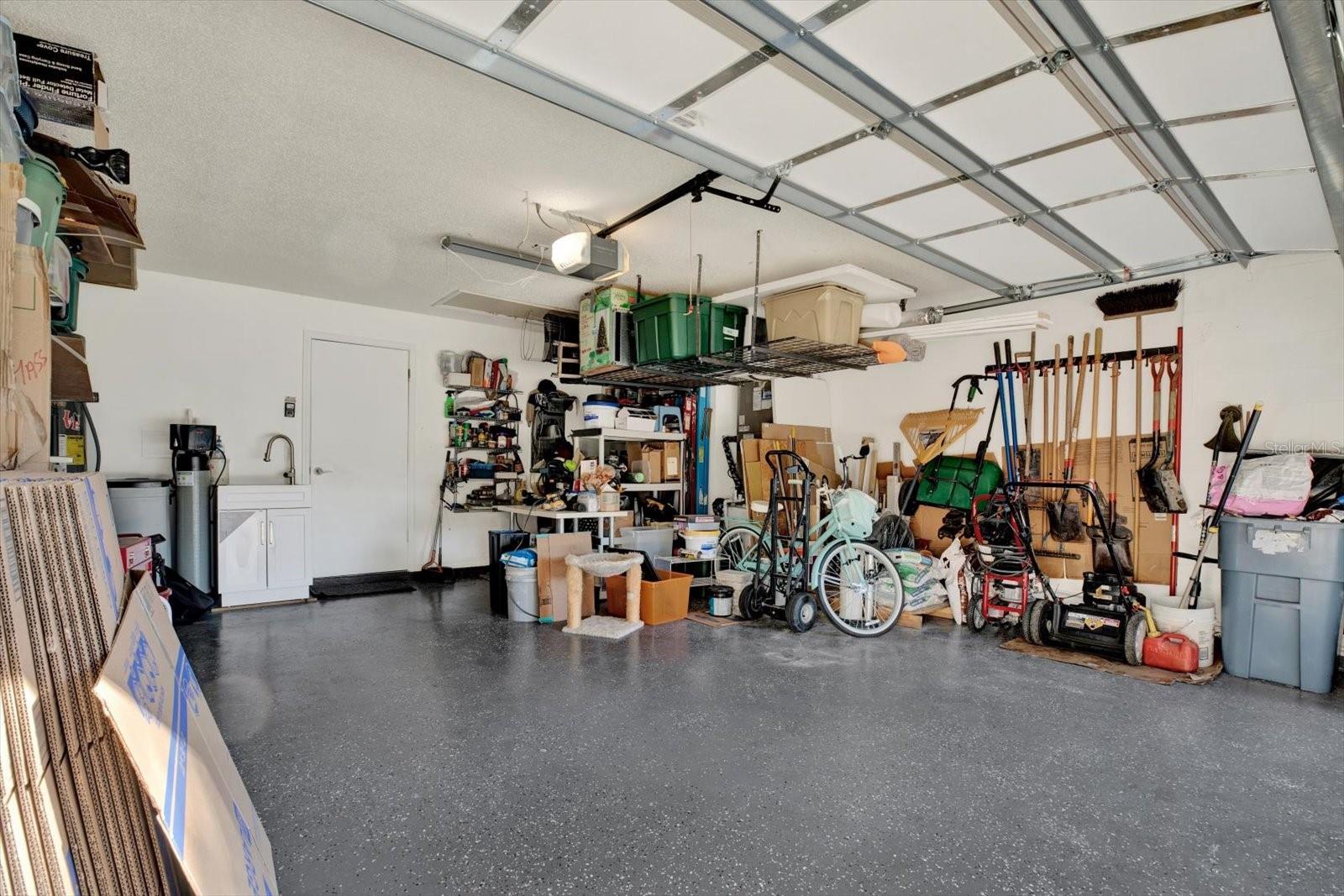 New Epoxy Flooring, Garage Door Insulation and Utility Tub