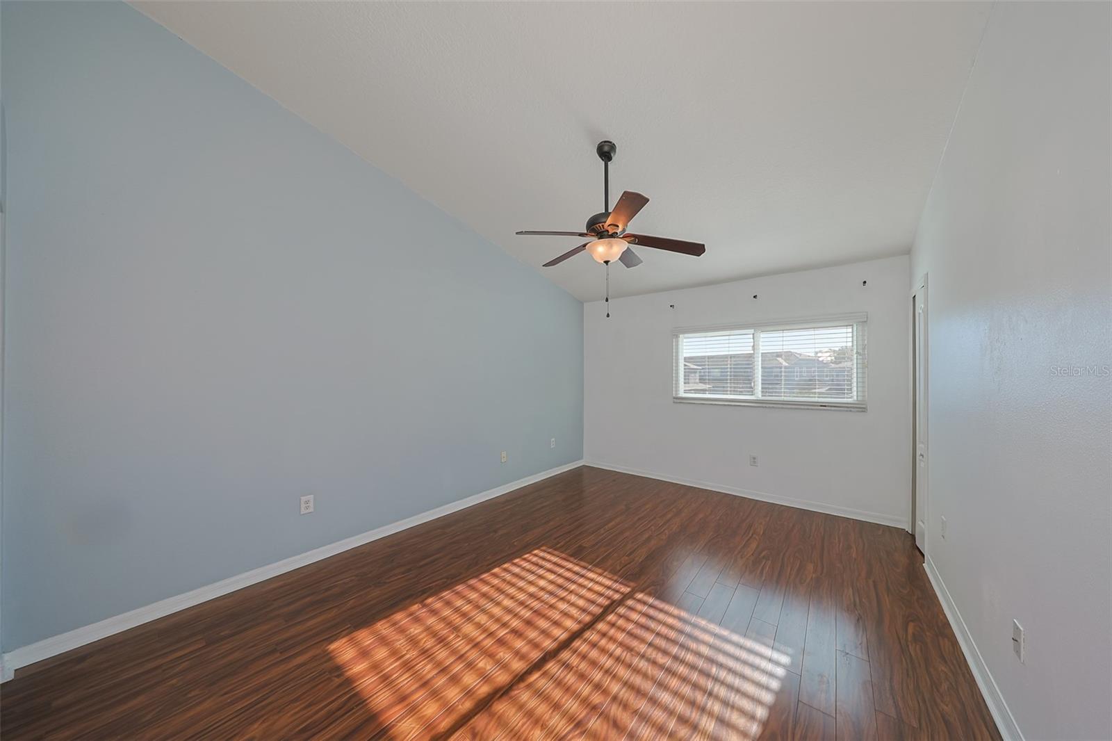 Primary Bedroom with ceiling fan