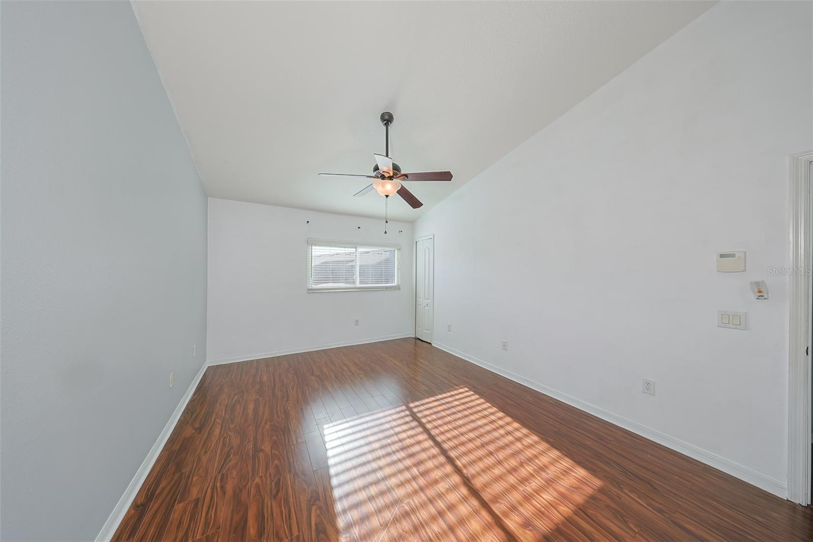 Small walk-in closet in back right corner of photo....large walk-in as you go towards en suite bath