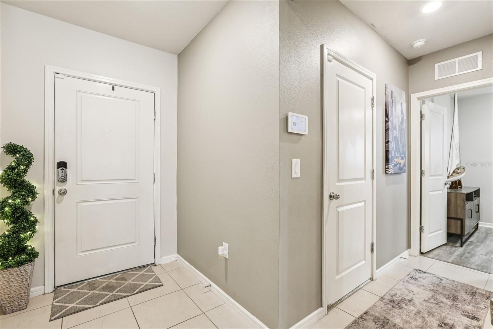 Front Door/Access to Garage/Office or Guest Bedroom