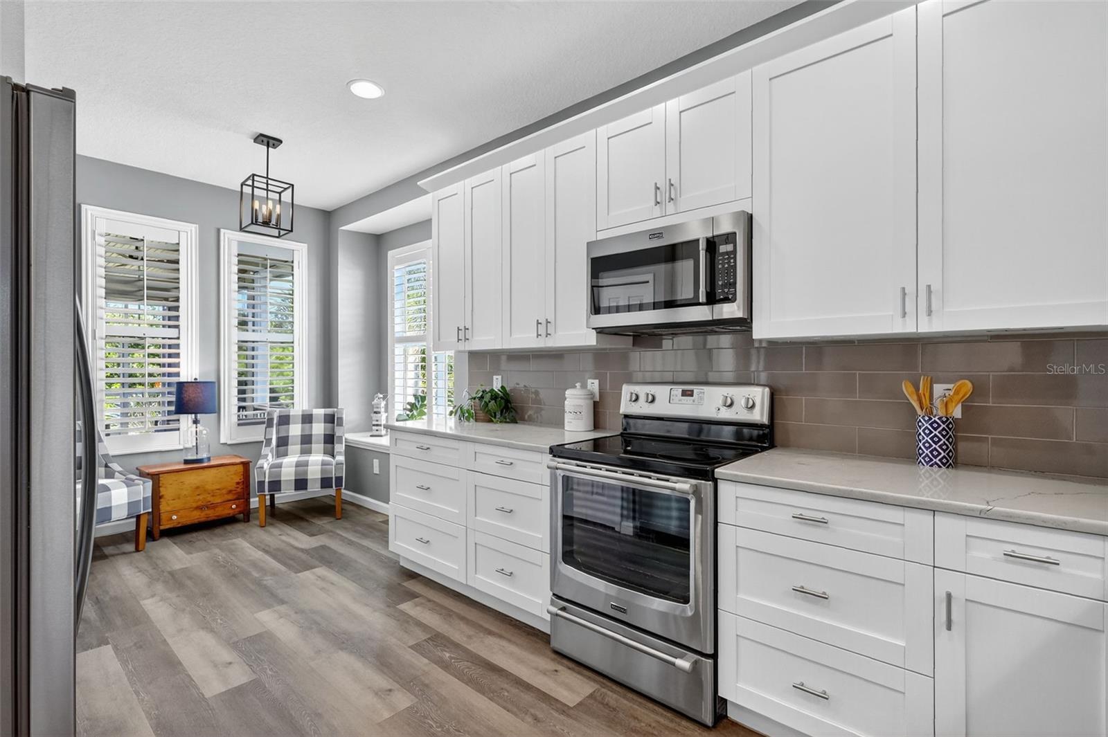 Updated Kitchen with View of Breakfast Nook (Seating Area shown here)