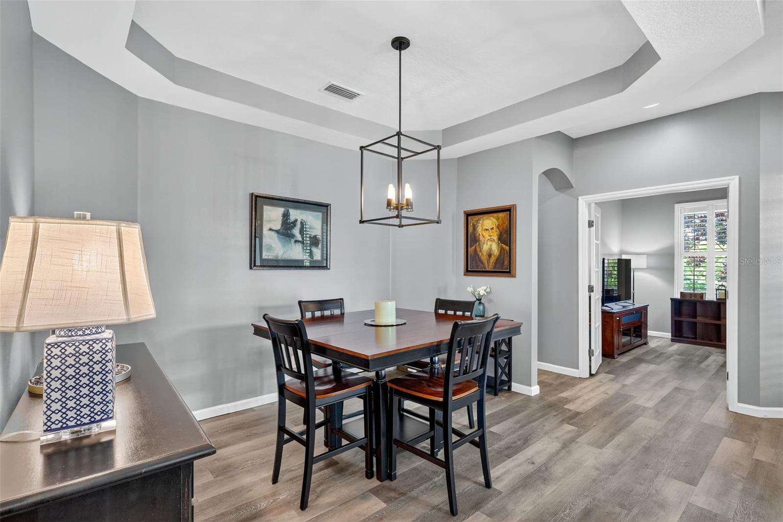 Spacious Dining Room and view of Den/Office on right