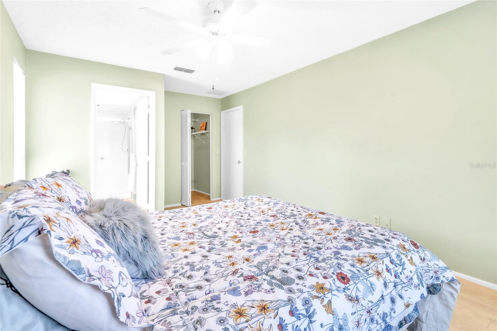 Primary Bedroom with walk in closet and ensuite bathroom