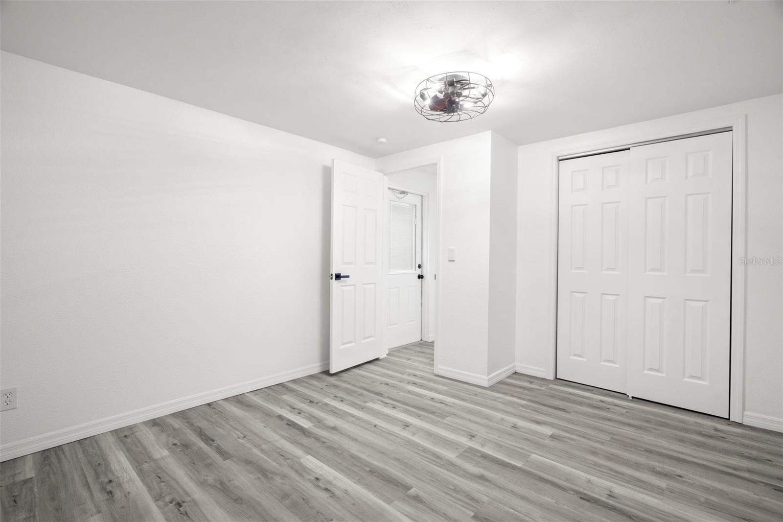 bonus room with view of back porch door