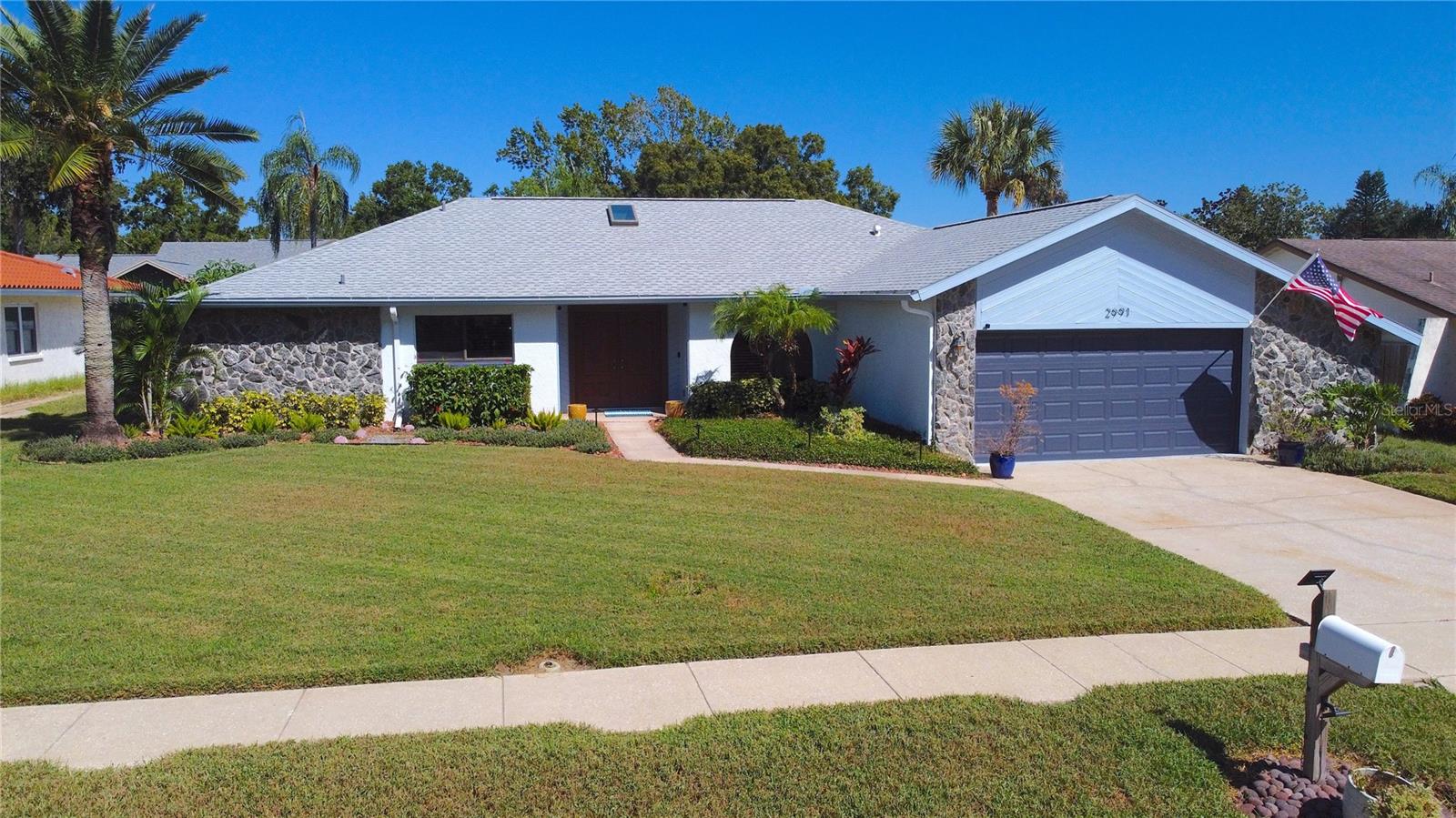 Welcome home to this lovely updated 4 bedroom 2 bath 2300+ sf. Pool Home located in the highly sought after community of Lake Valencia in Palm Harbor.