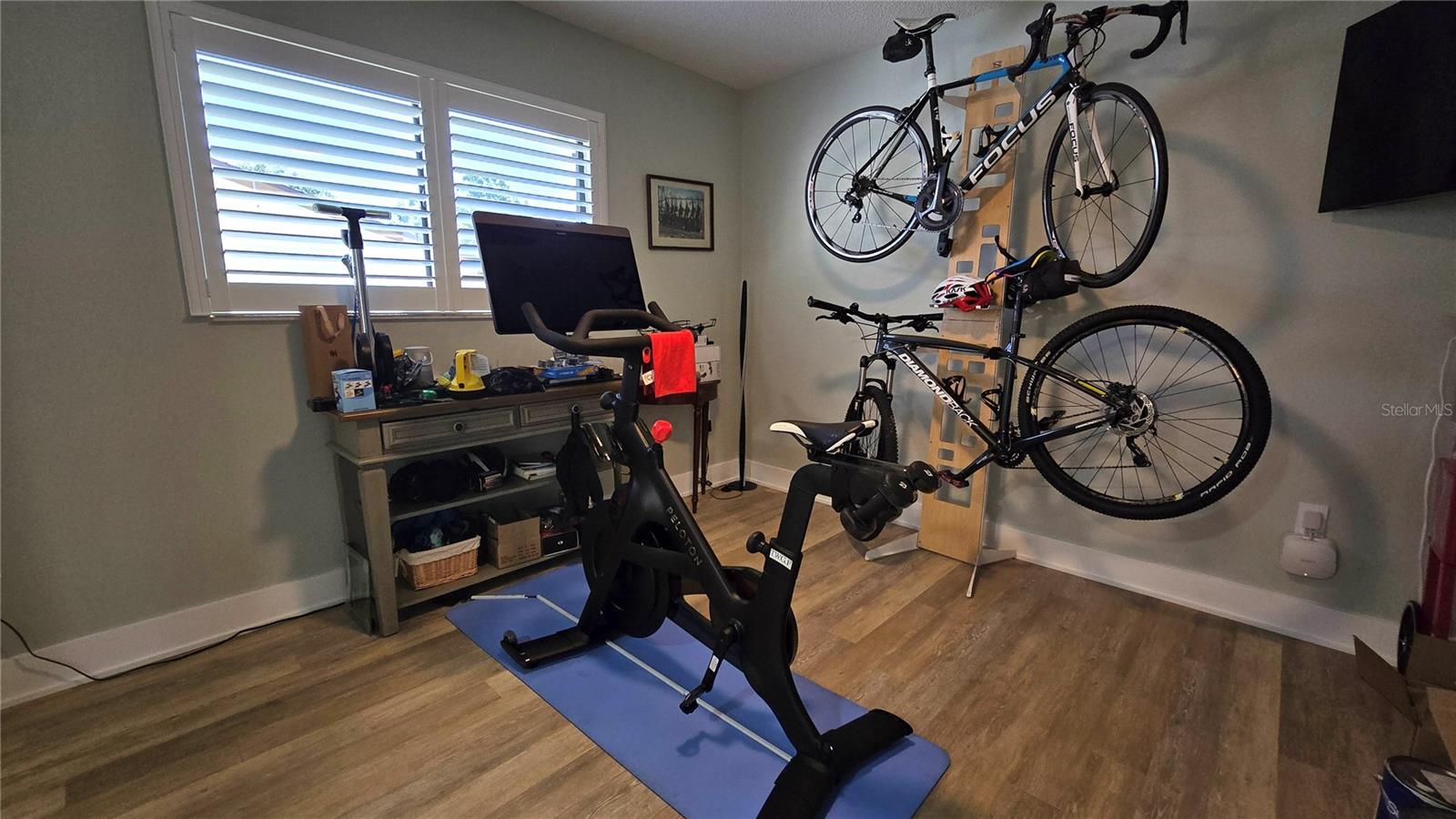 Bedroom being used as a workout room
