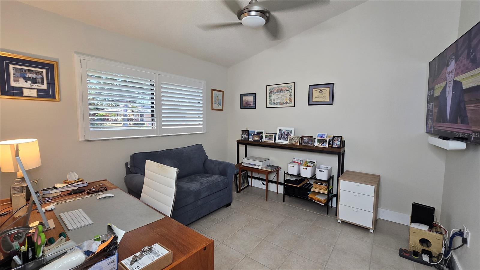Front Bedroom being used as a home office with a walk in closet.