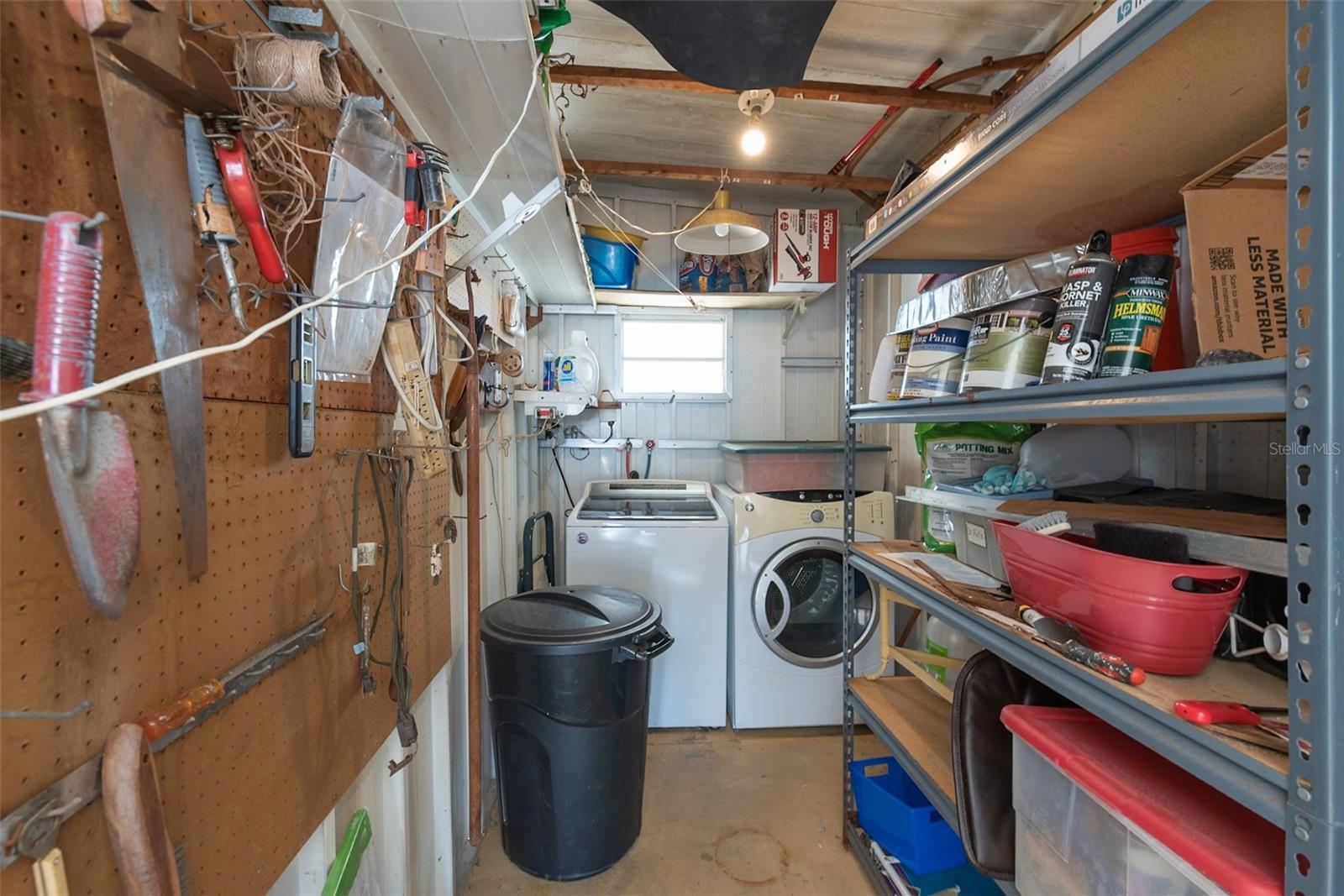 Laundry room and detached storage area.
