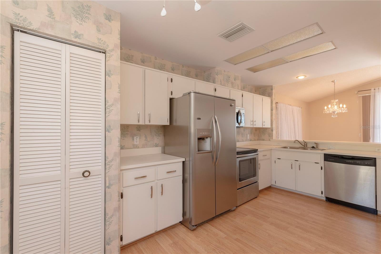 Kitchen with stainless steel appliances.