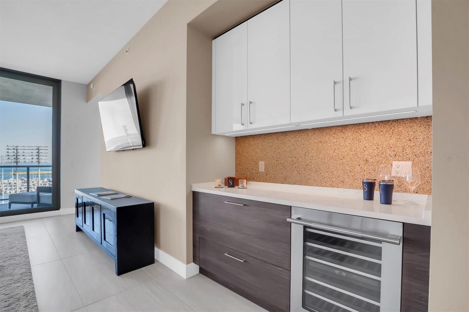 Dry bar with built-in wine cooler, perfect for effortless entertaining