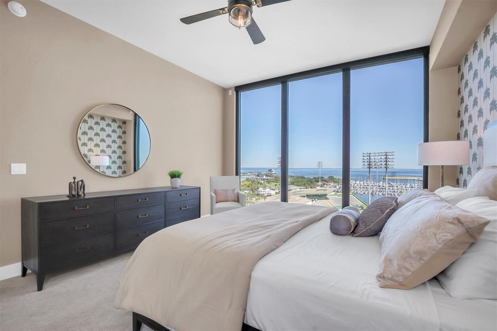 Primary ensuite overlooking Tampa Baywith custom room darkening shades