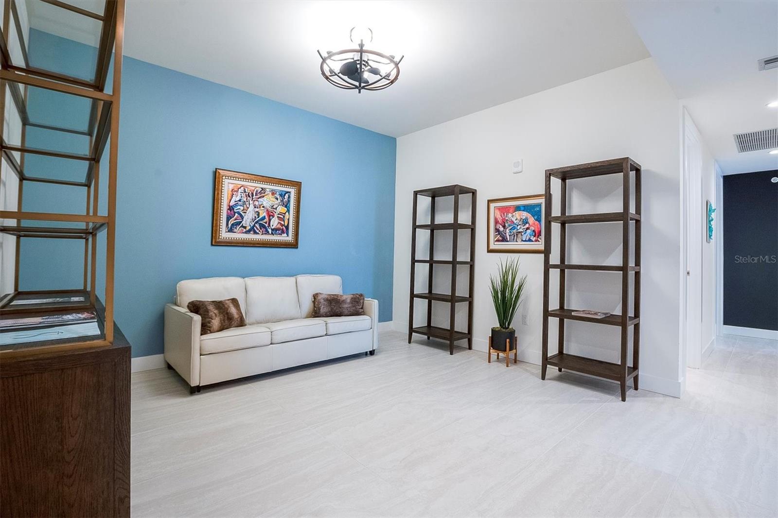 Versatile open den with accent wall