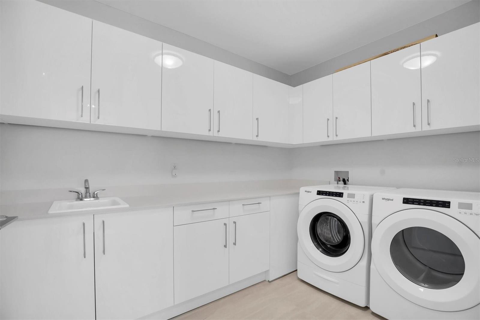 Spacious and convenient Laundry room with washer and dryer