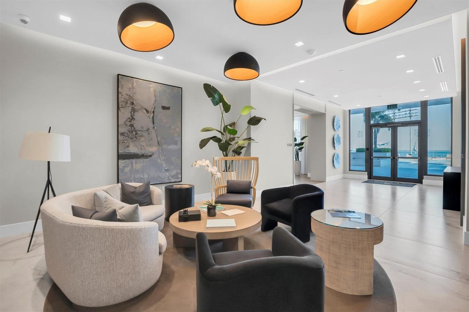 Enjoy the sitting area social room on the 7th floor, perfectly situated beside the resort pool, spa, and grilling area