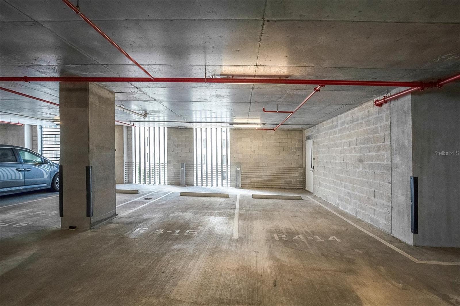 4th floor side by side assigned parking spaces