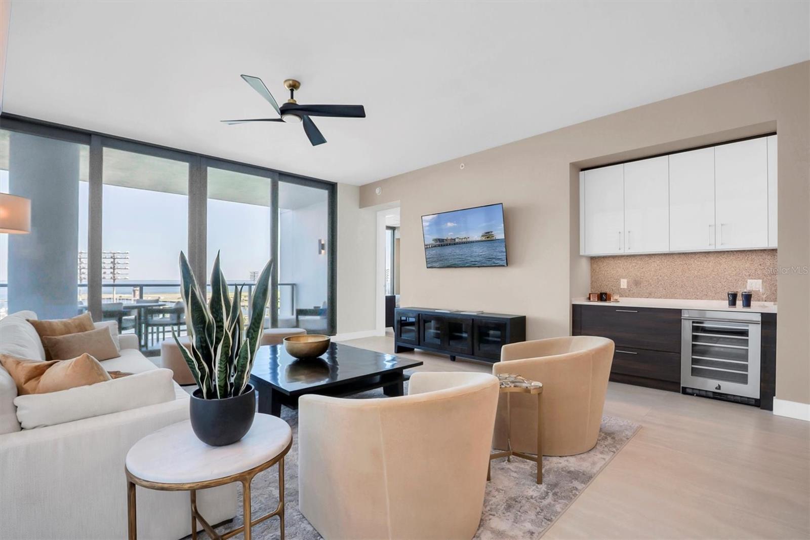 Dry bar in the Great room with wine cooler makes entertaining or unwinding a breeze