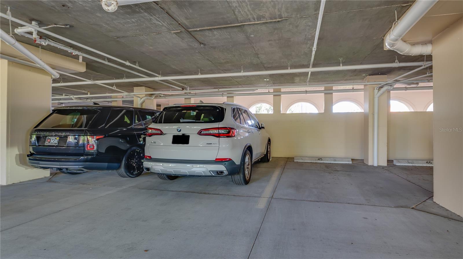 UNDER BUILDING ASSIGNED PARKING