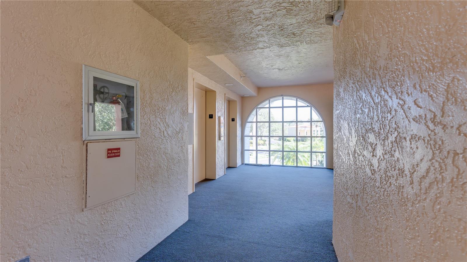 BUILDING ELEVATORS