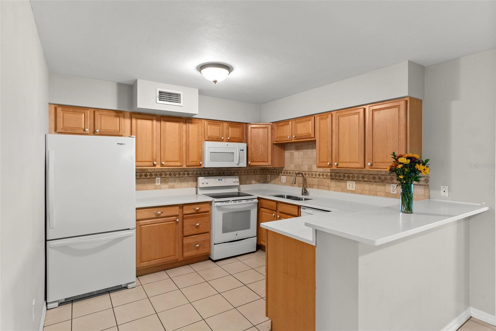 Solid Wood Cabinets 2025 Quartz Countertops Bar Seating
