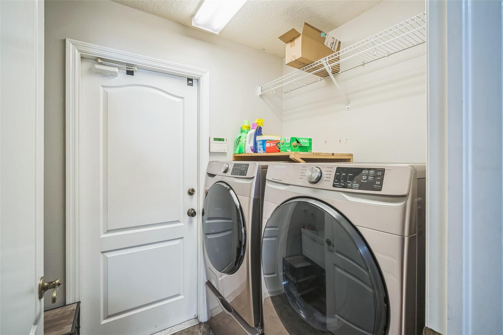 Laundry room right off of kitchen