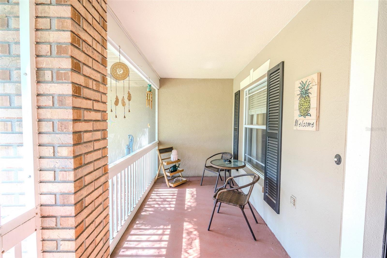 Adorable screened in front porch