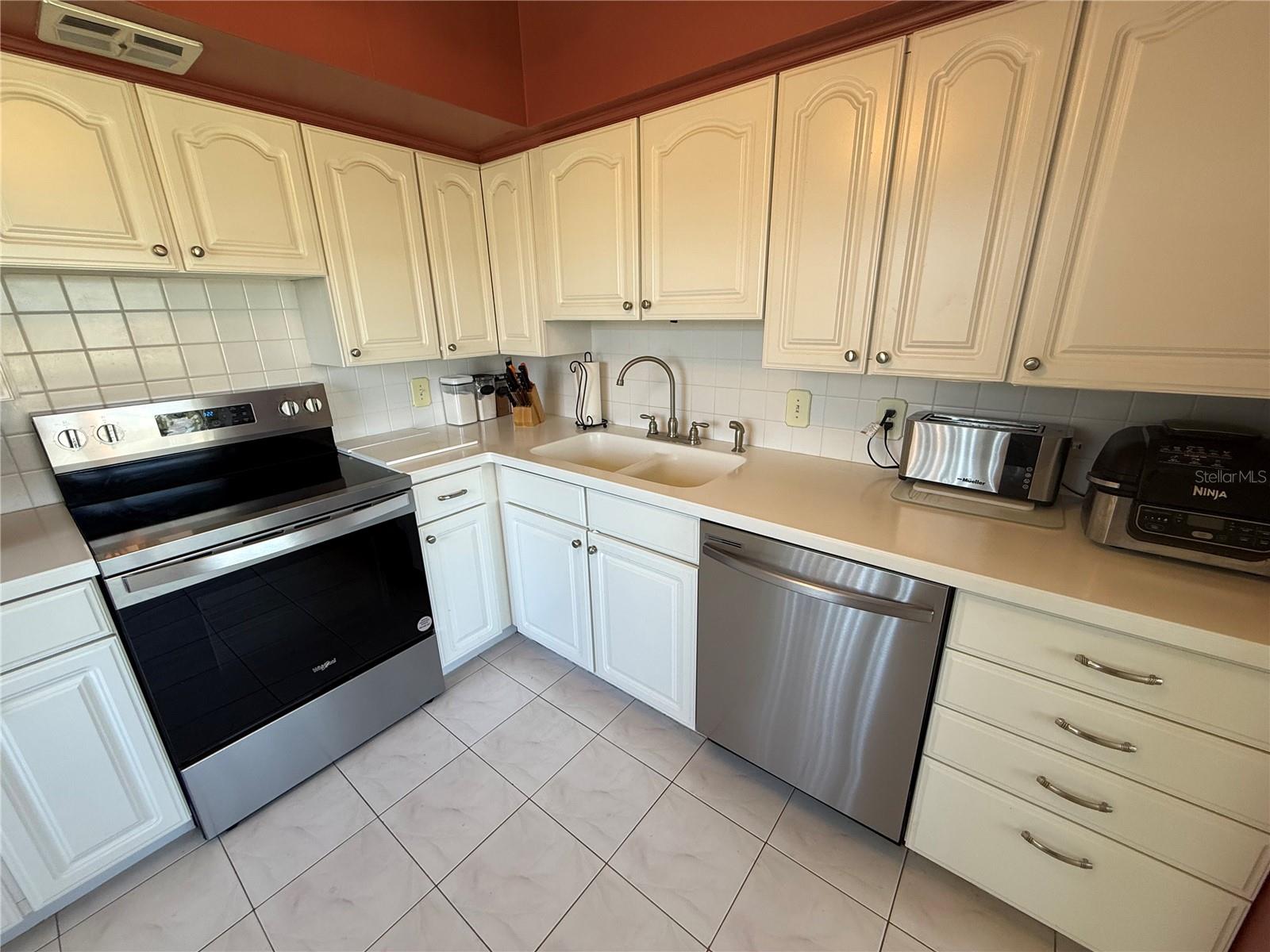Brand new range, dishwasher and disposal